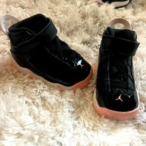 Infant hard bottom Black and pink Jordan 11’s